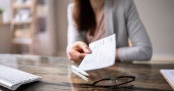 Woman holding a check
